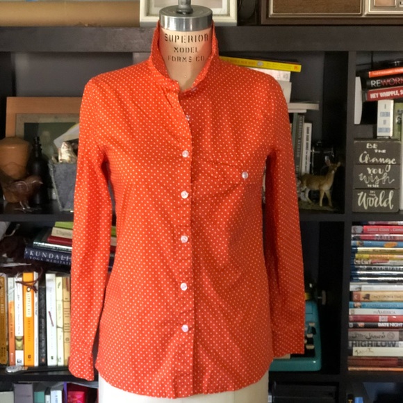 orange and white polka dot shirt